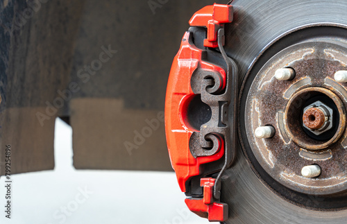 Photos Close-up of a red sports brake caliper
