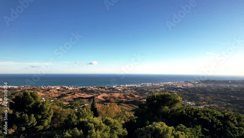 Mijas Pueblo white mountain village in Malaga, Andalusia, Spain - Aerial 4k