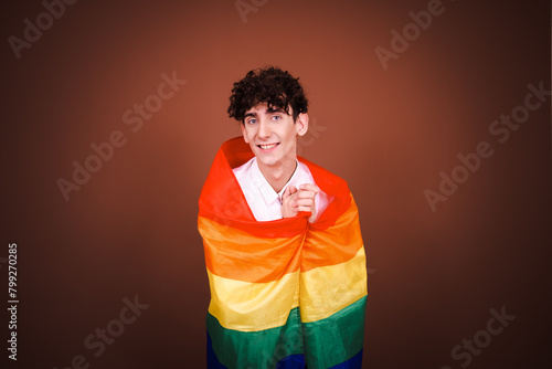 A young attractive guy posing in a photo studio. Funny gay in different situations.