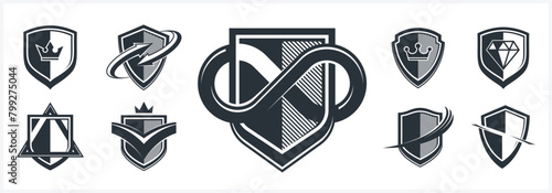 Classic shields shapes set with different additional elements vector symbols set, defense and safety icons, ammo emblems collection.
