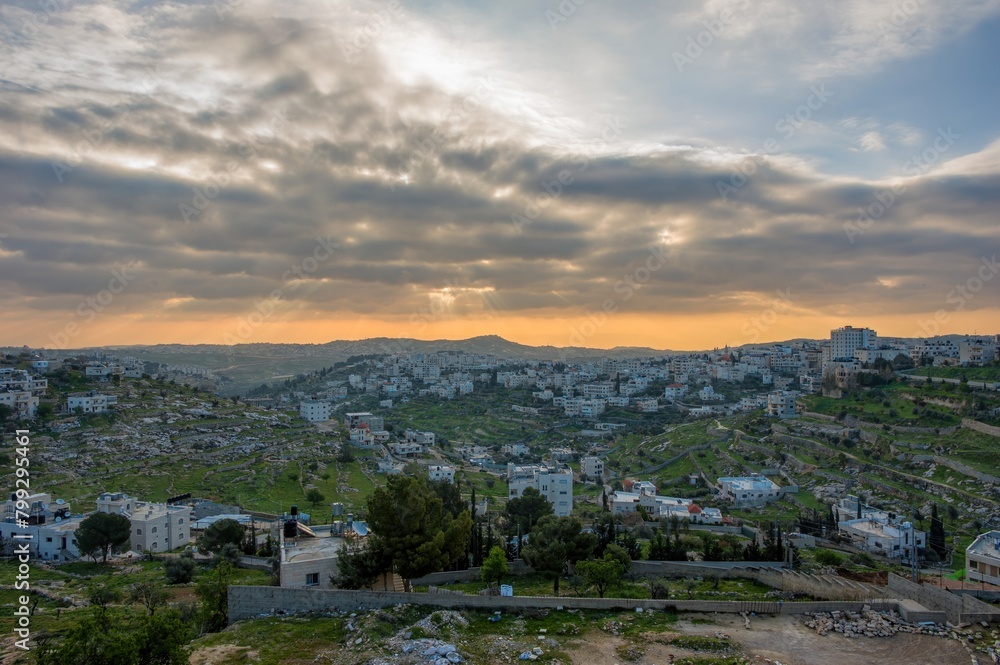City panorama in colorful sunrise in the old biblical city Bethlehem city, Holy Land, Birthplace of Jesus Christ.