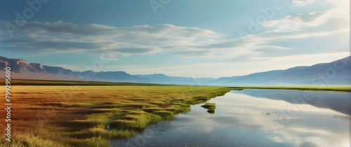 This captivating landscape showcases a tranquil marsh under the expansive blue sky  with mountains gently rising in the distance