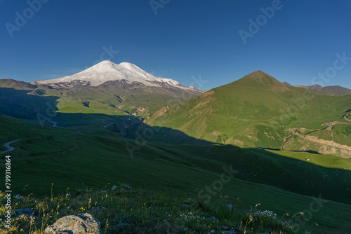 Mount Elbrus at sunrise Caucasus mountains photo