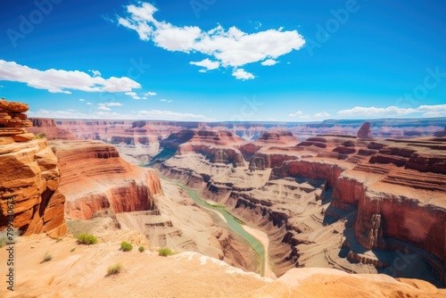 Breathtaking view of a vast canyon with a winding river
