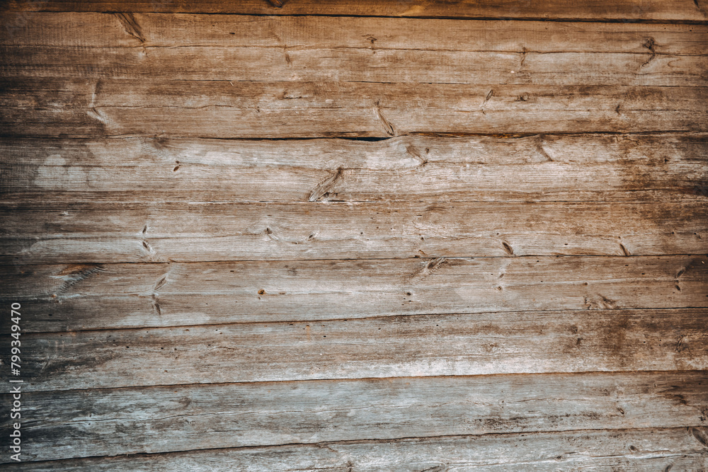 Naklejka premium Brown wooden background. Wood texture. It's an aged logs wall. Rustic style. Weathered board. Striped banner. Natural material