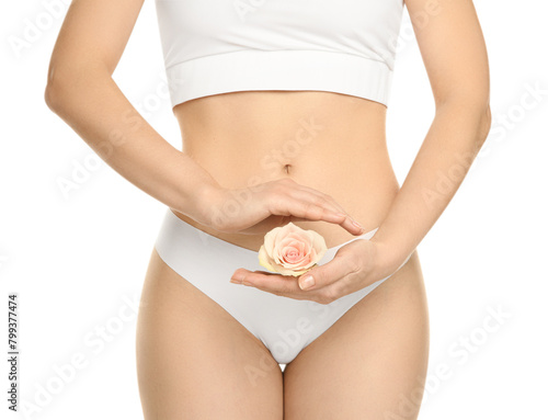 Gynecology. Woman in underwear with rose flower on white background, closeup © New Africa