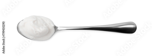 Delicious natural yogurt in spoon isolated on white, top view