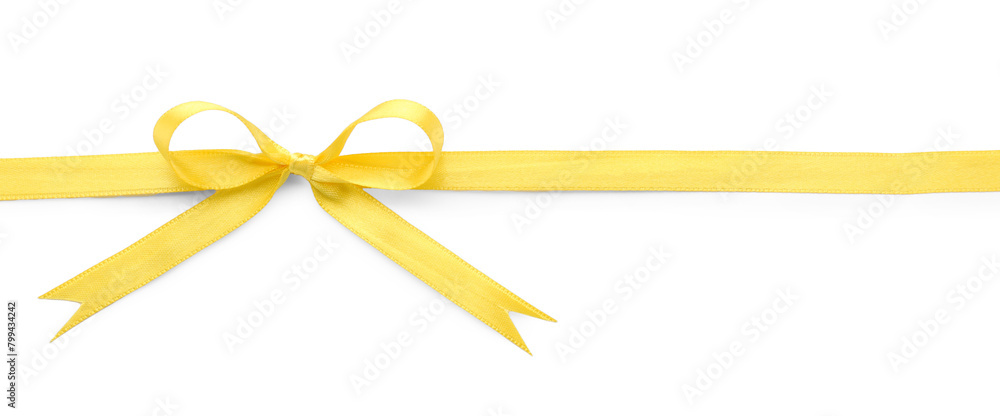 Yellow satin ribbon with bow on white background, top view Yellow satin ribbon with bow on white background, top view
