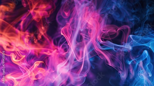 Abstract colorful smoke in blue and pink colors on black background