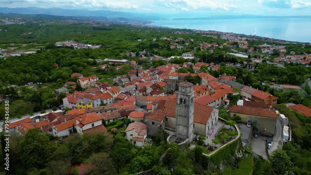 Kastav, a charming town perched on a hill overlooking the Adriatic Sea near Opatija, Croatia, offers a picturesque setting steeped in history and natural beauty captured by drone Kastav, a charming town perched on a hill overlooking the Adriatic Sea near Opatija, Croatia, offers a picturesque setting steeped in history and natural beauty captured by drone