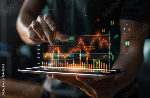 Businessman Analyzing Growth Graph on Interactive Tablet Display