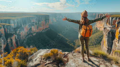 A traveler standing on a cliff overlooking a stunning landscape, arms outstretched with a big smile, embracing the happiness and adventure of exploring new destinations.
