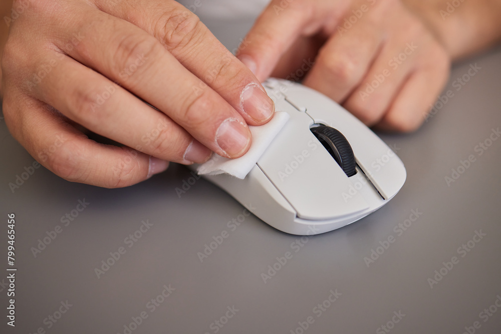 wipes cleaning disinfection of work mouse. Wiping with antibacterial wipe the surface of desk, keyboard wipes cleaning disinfection of work mouse. Wiping with antibacterial wipe the surface of desk, keyboard