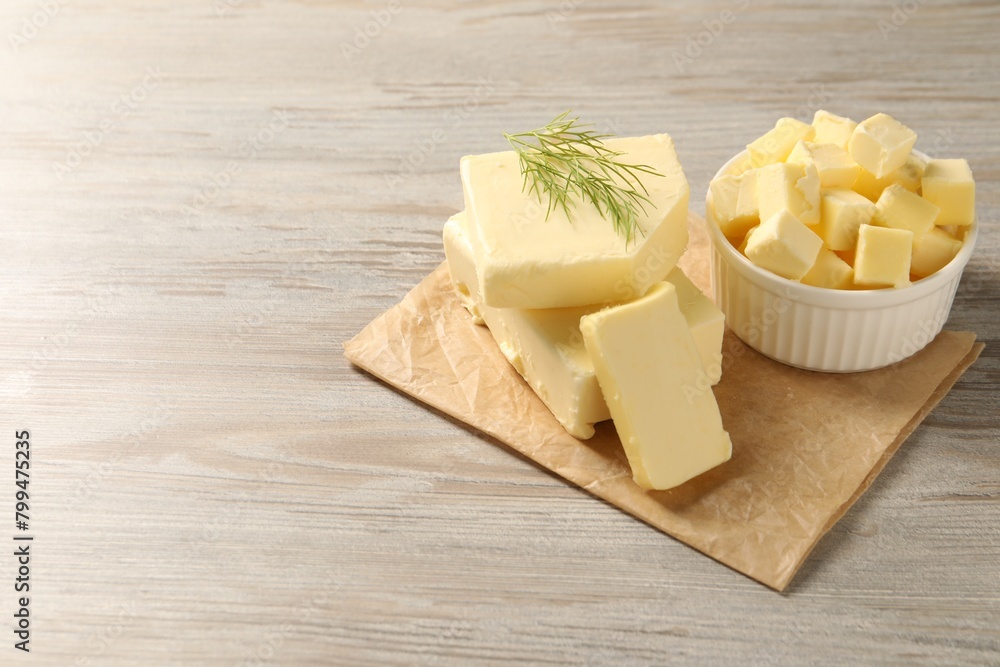 Tasty butter with dill on wooden table. Space for text Tasty butter with dill on wooden table. Space for text