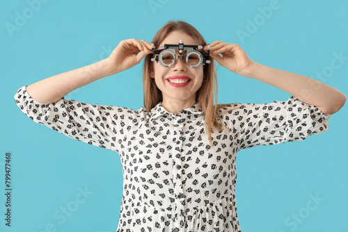 Young woman in trial frame ...