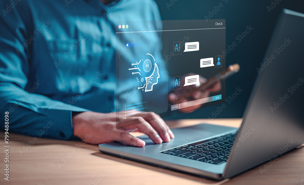 search, find, seo, graph, management, marketing, optimization, research, strategy, information. A man is using a laptop with a screen that shows ai dashboard virtual screen and a smartphone. search, find, seo, graph, management, marketing, optimization, research, strategy, information. A man is using a laptop with a screen that shows ai dashboard virtual screen and a smartphone.