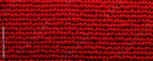 Red close-up of monochrome carpet texture background from above. Texture tight weave carpet blank empty pattern with copy space for product 
