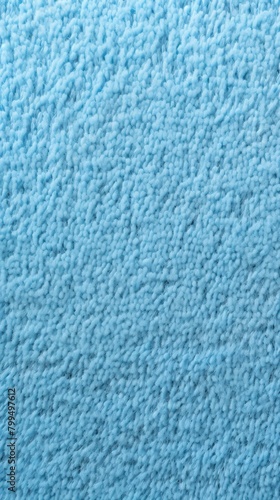 Sky blue close-up of monochrome carpet texture background from above. Texture tight weave carpet blank empty pattern with copy space for product 