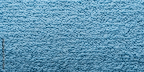 Sky blue close-up of monochrome carpet texture background from above. Texture tight weave carpet blank empty pattern with copy space for product 