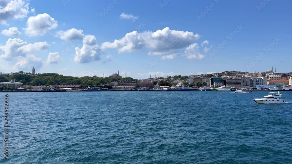 Turkey, August 5, 2022: View of Istanbul and its sights from a ferry sailing through the waters of the Bosphorus. A passenger ship. Bosphorus Tour. 4K Turkey, August 5, 2022: View of Istanbul and its sights from a ferry sailing through the waters of the Bosphorus. A passenger ship. Bosphorus Tour. 4K