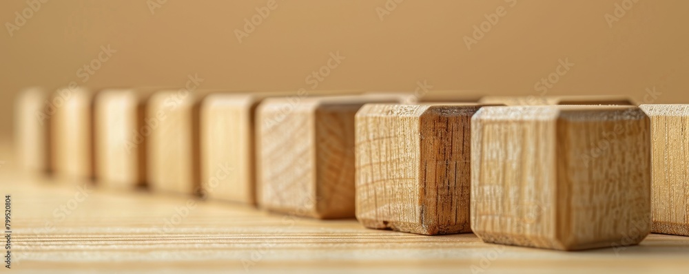 A series of wooden blocks lined up with one block separated ahead, representing pioneering leadership and initiative, minimalist and clean background, space for text