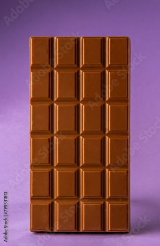 chocolate bar isolated on purple background
