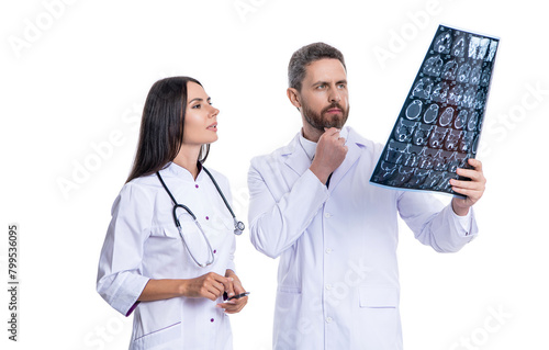 healthcare and medicine. healthcare with doctor on diagnostic examination in clinic. Doctor and Radiologist Discuss Diagnosis with mri scan. doctor give quality healthcare. Neurologist treatment © be free