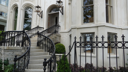 Savannah GA Entranceway of a Stately, elegant home in the Historic District  shaded by Live oak trees and lush greenery photo