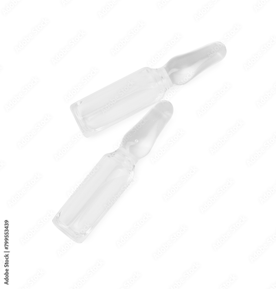 Glass ampoules with liquid isolated on white, top view Glass ampoules with liquid isolated on white, top view