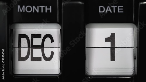 retro flip calendar with a date change from the thirty-first of December to the first of January. daily calendar with a change of days of the month. calendar concept, reminders, events. close up.