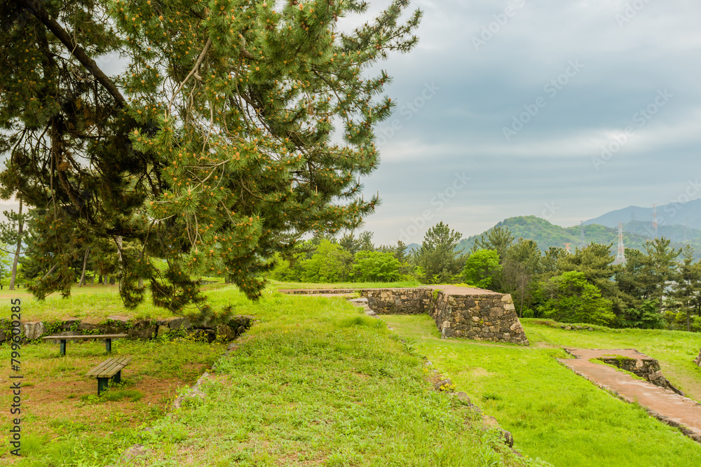 Remains of Japanese stone fortress and park benches in Suncheon, South Korea.
