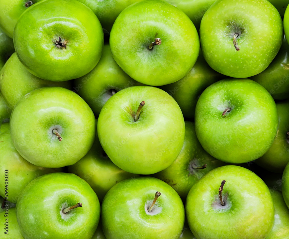 Green apples look fresh and neatly arranged Green apples look fresh and neatly arranged