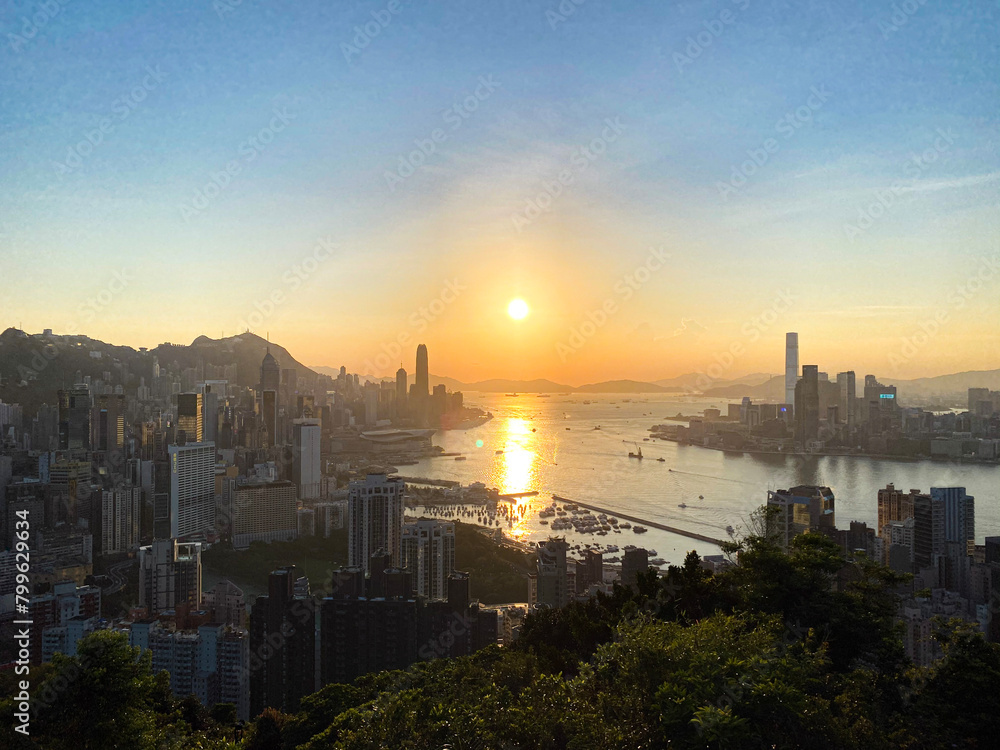 Golden Sunset Over Hong Kong Skyline