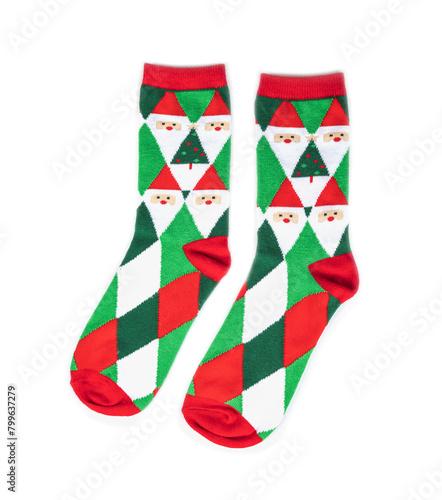 Red and green striped socks on white background