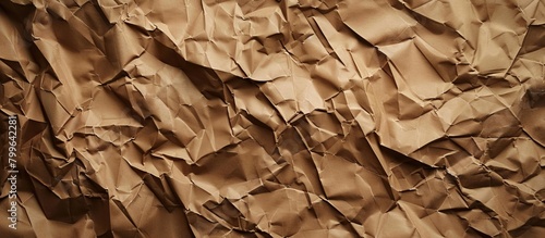 Close-up view of a textured brown paper against a dark black background, creating a subtle and elegant visual contrast