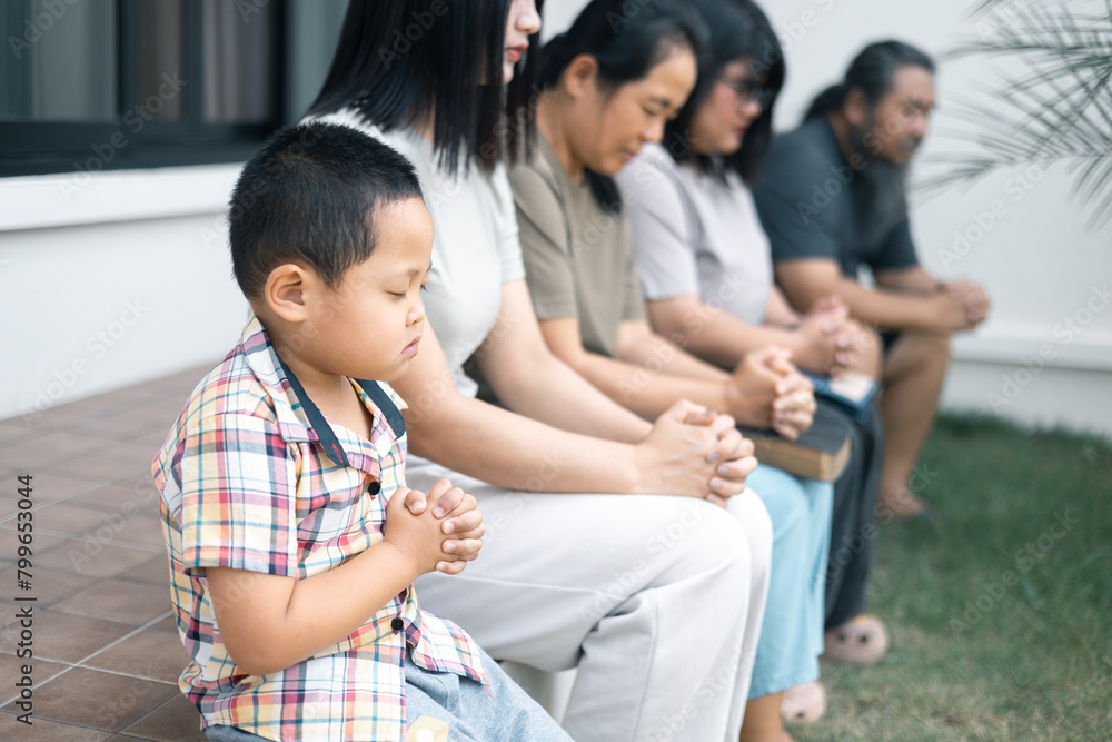 Christian woman held hands with the group, expressing their faith through prayer and devotion to God, uniting in their shared religion. Friends, Group christian pray concept. Christian woman held hands with the group, expressing their faith through prayer and devotion to God, uniting in their shared religion. Friends, Group christian pray concept.