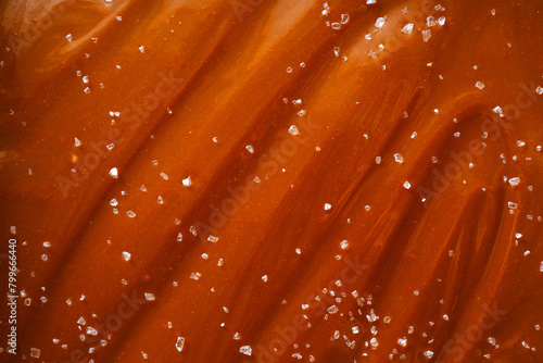 Homemade salted caramel sauce background texture