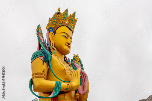 Large, colorful Buddha statue at the Diskit Monastery in the Nubra Valley in northern India photo