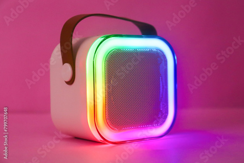 Multicolor Bluetooth Speaker Closeup On The Pink Background photo