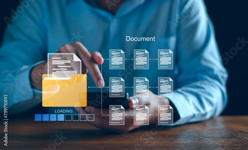 Document management system concept. Businessman manage digital business data, file storage, database document and file collection. Technology software computer manage file document business company.