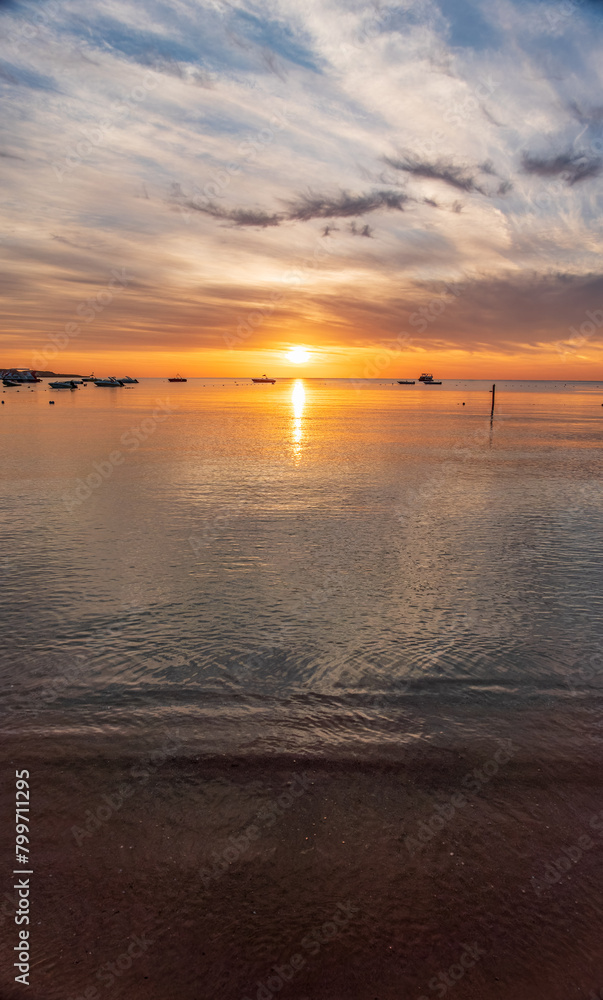 Obraz premium Beautiful red and orange sunrise over the sea.