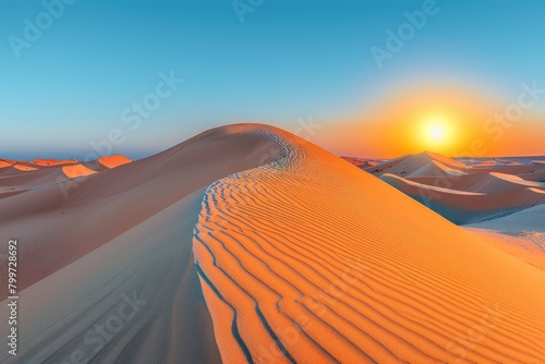 The first light of dawn casts a warm glow over the smooth  undulating dunes of the Sahara Desert  creating a peaceful landscape.