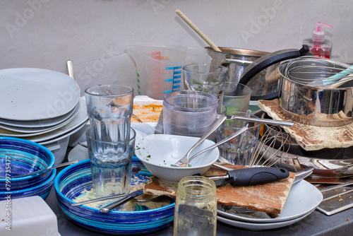 Chaotic Kitchen: Dirty Dishes and Cluttered Countertop