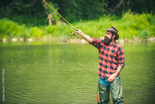 Man with fishing rod, fisherman men in river water outdoor. Summer fishing hobby.