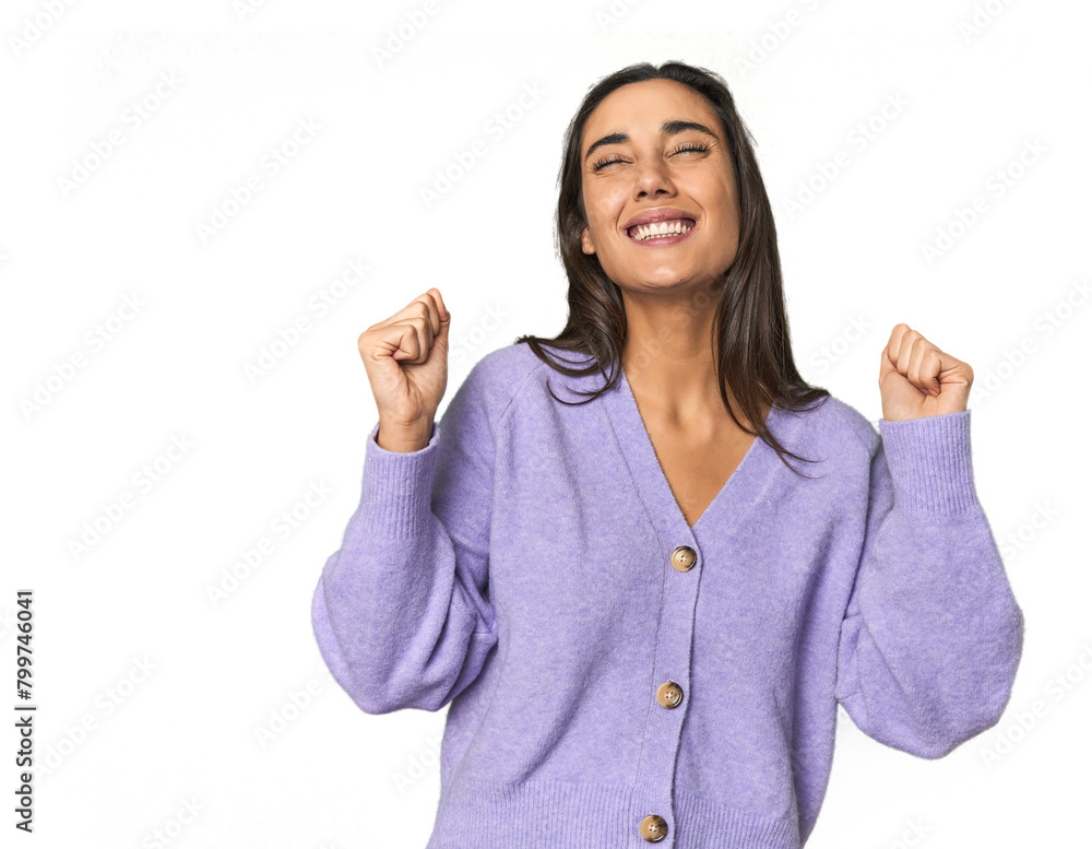 Hispanic young woman celebrating a victory, passion and enthusiasm, happy expression. Hispanic young woman celebrating a victory, passion and enthusiasm, happy expression.