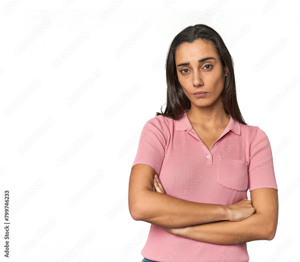 Hispanic young woman suspicious, uncertain, examining you. Hispanic young woman suspicious, uncertain, examining you.
