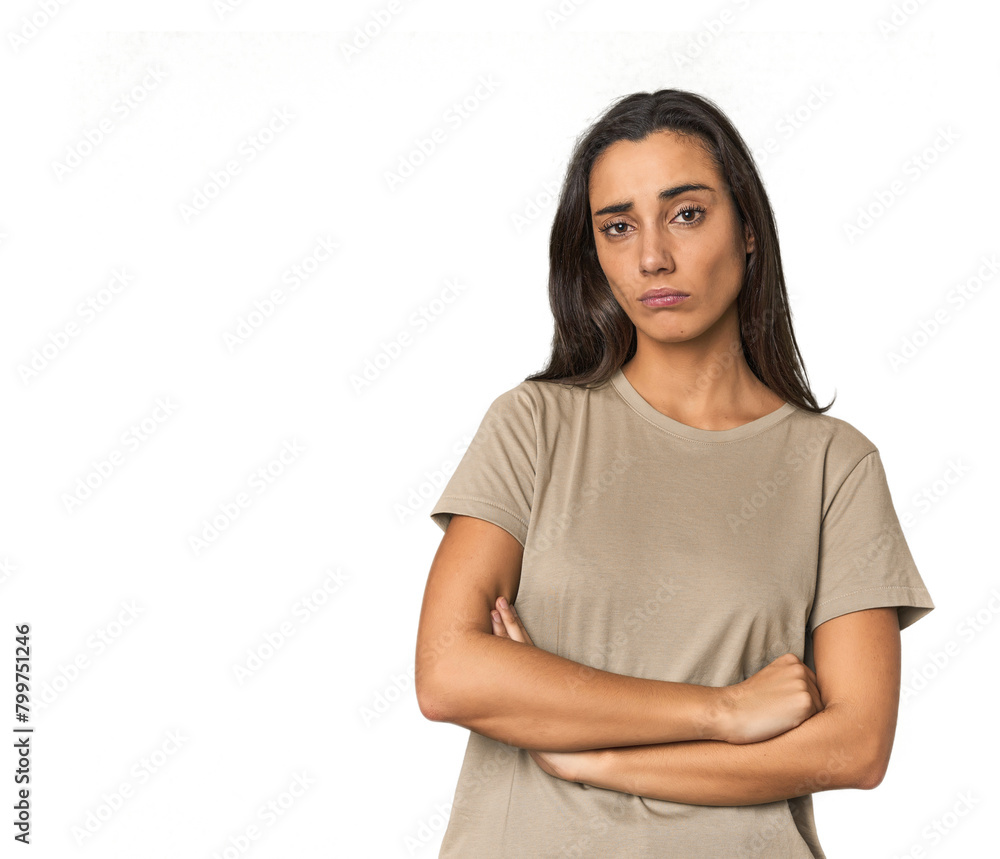 Hispanic young woman suspicious, uncertain, examining you. Hispanic young woman suspicious, uncertain, examining you.