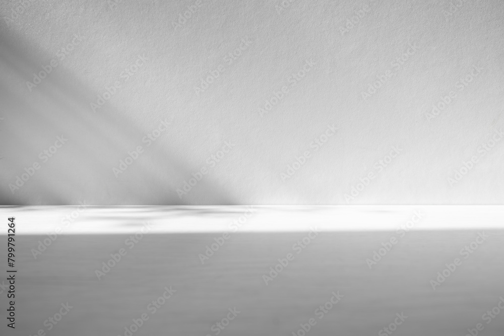 Wall interior background, studio and backdrops show products.with shadow from window color white and grey. background for text insertion and presentation product Wall interior background, studio and backdrops show products.with shadow from window color white and grey. background for text insertion and presentation product