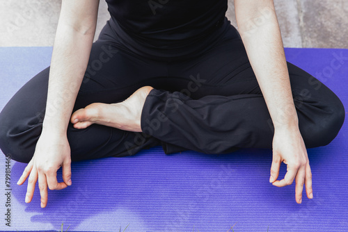Close-up of Yoga Practitioner in Lotus Position
