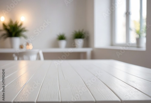 A white table stands against a blurred background, creating a minimalist yet inviting scene